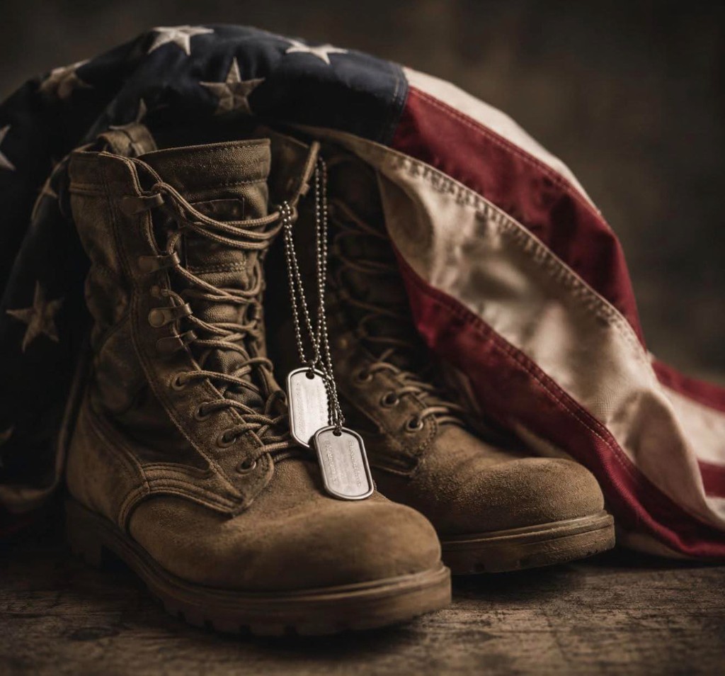 Combat boots with American flag and dog tags