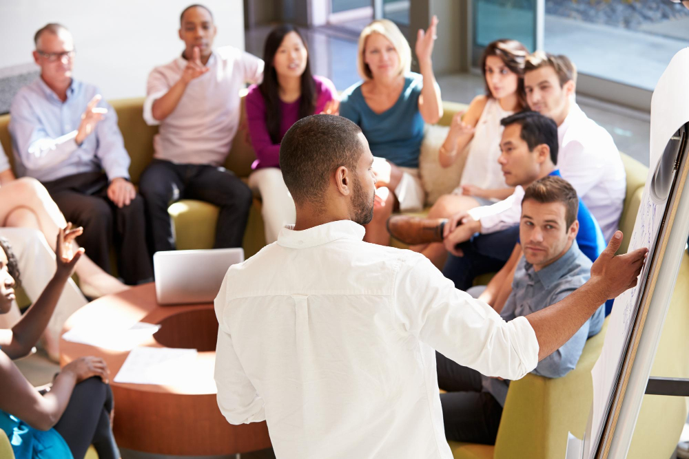 Speaker presenting to a small seminar group